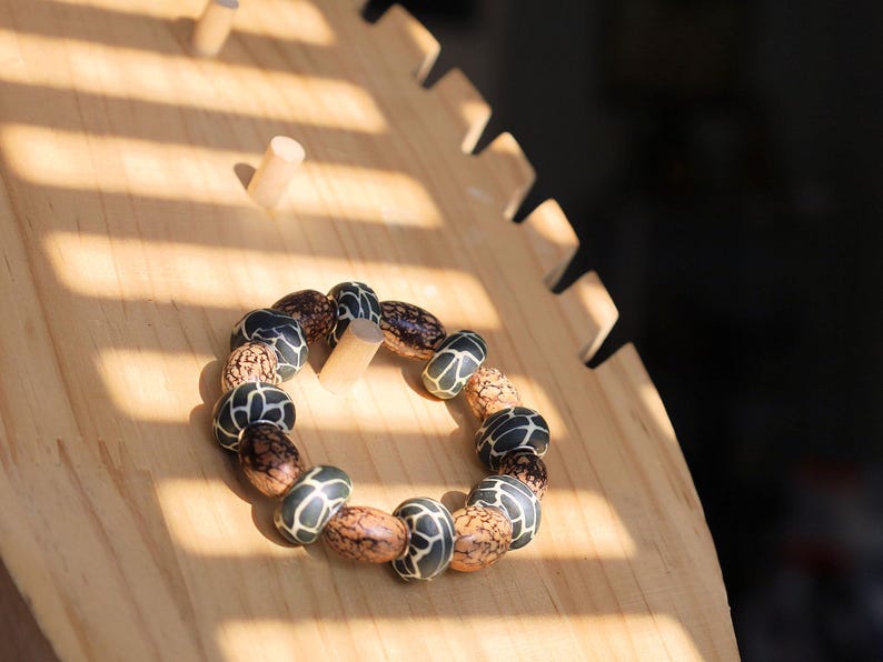 Undyed Natural Bodhi Beads, Oval, Leather beads are typically handmade, requiring skill and craftsmanship.