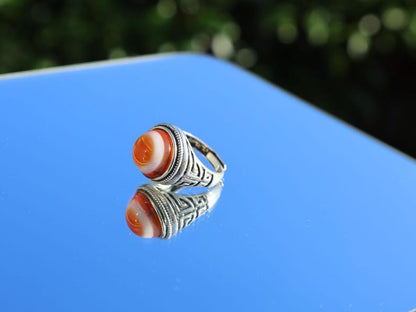 Handmade Tibetan Evil-Eye dZi Bead Ring. This ring is ideal for those seeking both style and spiritual protection.