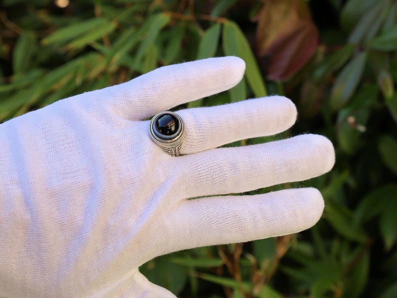 Handmade Tibetan Evil-Eye dZi Bead Ring. This ring is ideal for those seeking both style and spiritual protection.