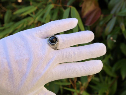 Handmade Tibetan Evil-Eye dZi Bead Ring. This ring is ideal for those seeking both style and spiritual protection.