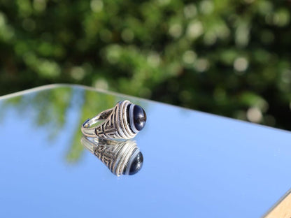 Handmade Tibetan Evil-Eye dZi Bead Ring. This ring is ideal for those seeking both style and spiritual protection.