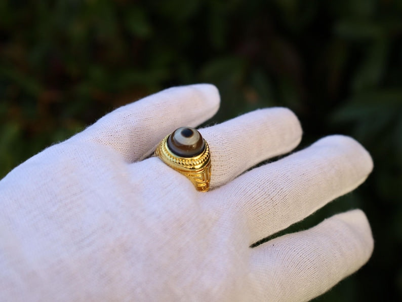 Handmade Tibetan Evil-Eye dZi Bead Ring. This ring is ideal for those seeking both style and spiritual protection.