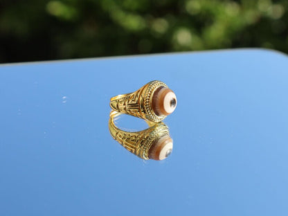 Handmade Tibetan Evil-Eye dZi Bead Ring. This ring is ideal for those seeking both style and spiritual protection.