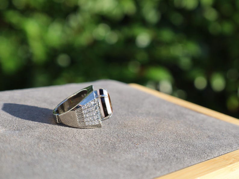 Handmade Tibetan Evil-Eye dZi Bead Ring. This ring is ideal for those seeking both style and spiritual protection.