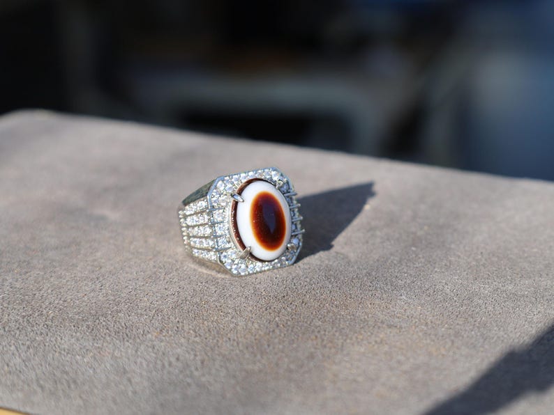 Handmade Tibetan Evil-Eye dZi Bead Ring. This ring is ideal for those seeking both style and spiritual protection.