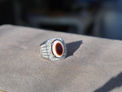 Handmade Tibetan Evil-Eye dZi Bead Ring. This ring is ideal for those seeking both style and spiritual protection.