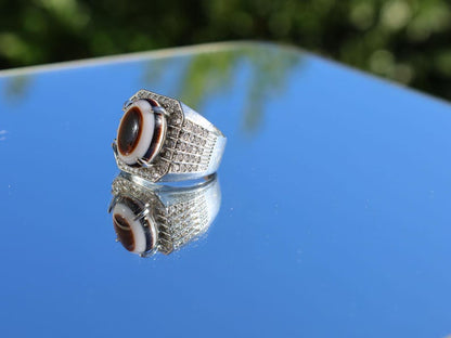 Handmade Tibetan Evil-Eye dZi Bead Ring. This ring is ideal for those seeking both style and spiritual protection.