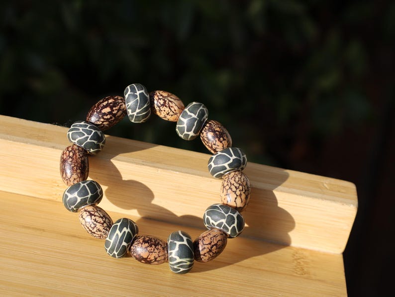 Undyed Natural Bodhi Beads, Oval, Leather beads are typically handmade, requiring skill and craftsmanship.