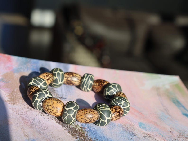 Undyed Natural Bodhi Beads, Oval, Leather beads are typically handmade, requiring skill and craftsmanship.