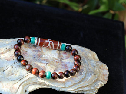 Big Man (Aristocrat) dZi Bead with Red Tiger eye and Tibetan turquoise buddhist prayer beads. The beads are made of Green Turquoise paste.