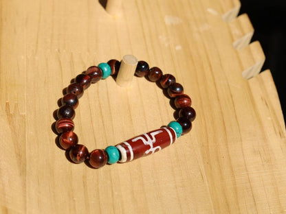 Big Man (Aristocrat) dZi Bead with Red Tiger eye and Tibetan turquoise buddhist prayer beads. The beads are made of Green Turquoise paste.