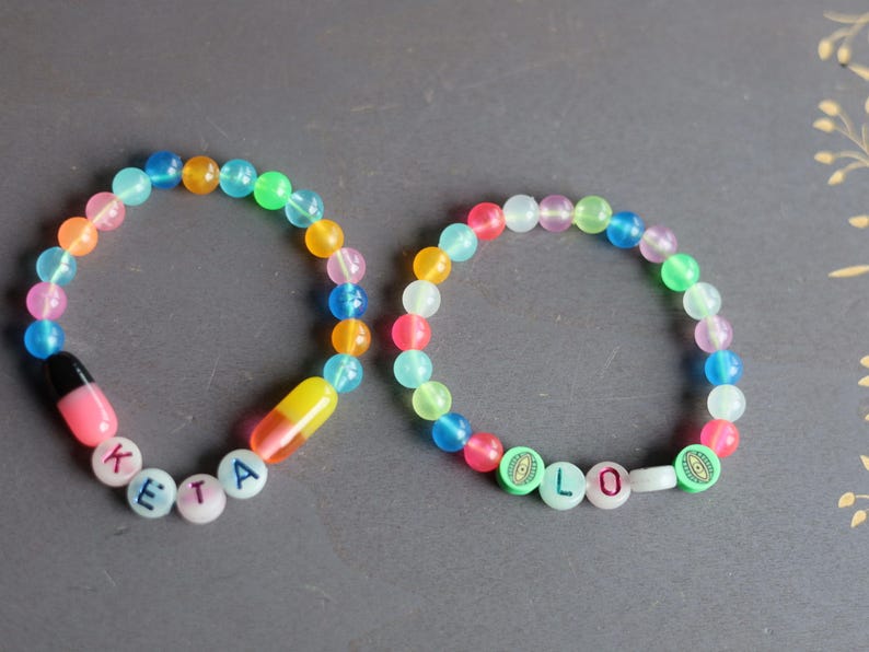 Set bracelets- Luminous Acrylic Beads, different glow in the dark colors combined with UV Reactive bracelets. Exclusive, Unique&UV Reactive!