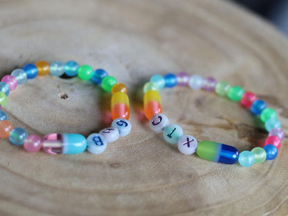 Set bracelets- Luminous Acrylic Beads, different glow in the dark colors combined with UV Reactive bracelets. Exclusive, Unique&UV Reactive!