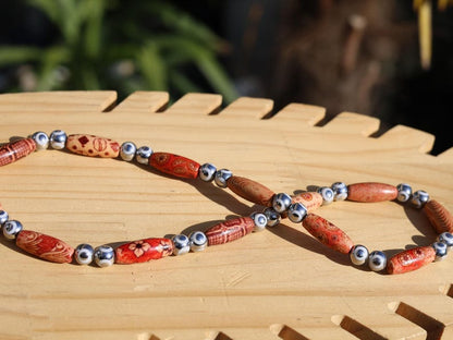 White  Electroplate Glass Beads Strands, Round with Evil Eye Pattern,Orange. Evil eye beads typically feature a design of an eye