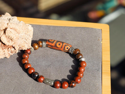 Nine-eye dZi bead with Golden Swan 8mm beads – A Symbol of Strength, Protection & Prosperity. A Beacon of Luck and Divine Favor