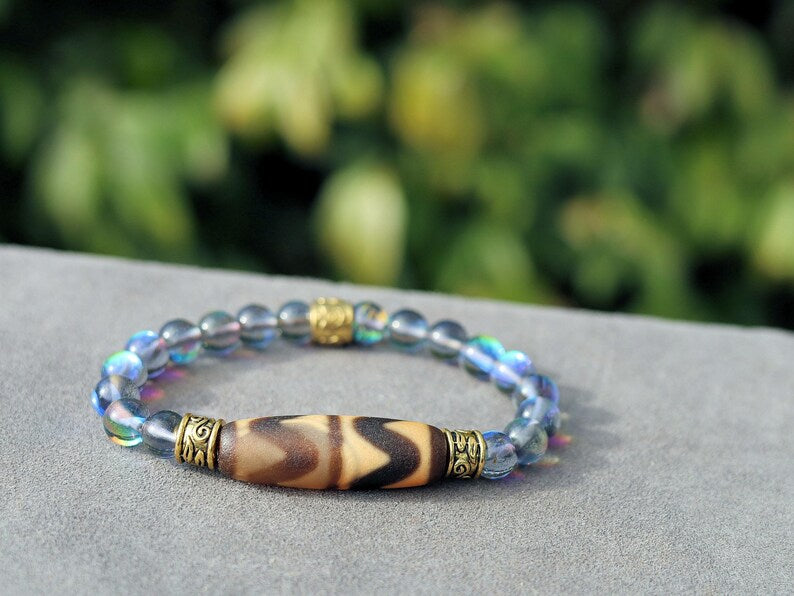 Old Double DZI Tiger’s Teeth Bracelet with Mystic Aura Quartz beads. Visually striking with profound spiritual significance.