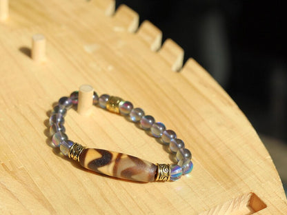 Old Double DZI Tiger’s Teeth Bracelet with Mystic Aura Quartz beads. Visually striking with profound spiritual significance.