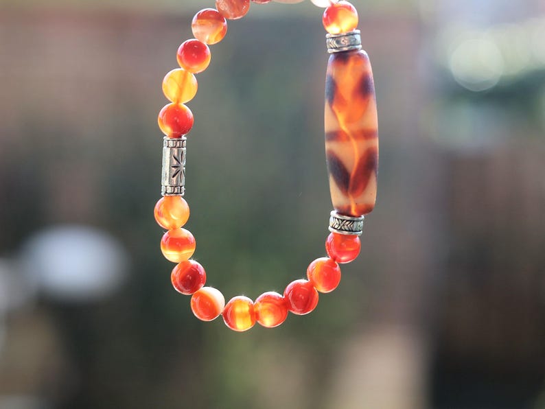 Old Double DZI Tiger’s pattern Bracelet with Red Agate was known as the Warriors Stone. face challenges and adversities, protective amulets