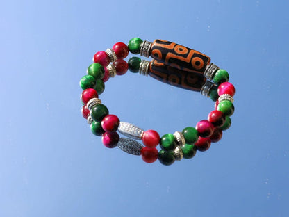 Nine-eye dZi bead with Golden Swan 8mm beads – A Symbol of Strength, Protection & Prosperity. A Beacon of Luck and Divine Favor