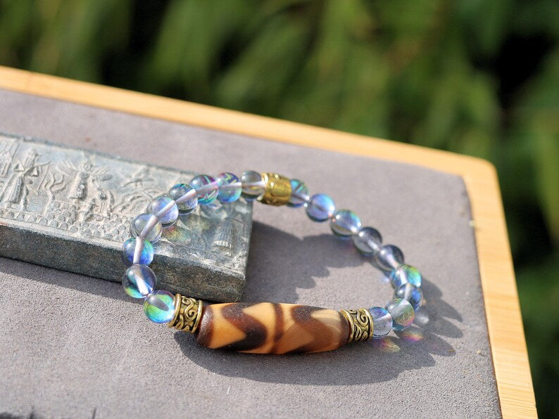 Old Double DZI Tiger’s Teeth Bracelet with Mystic Aura Quartz beads. Visually striking with profound spiritual significance.