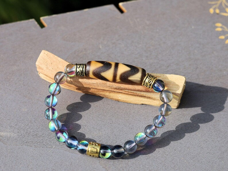 Old Double DZI Tiger’s Teeth Bracelet with Mystic Aura Quartz beads. Visually striking with profound spiritual significance.