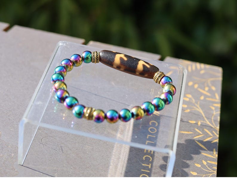 Old Unique DZI Tiger’s Teeth Bracelet with Nice Plated Natural Electro Color Rainbow Hematite bracelet.  associated with success, ambition