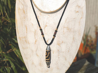 Rare to find, Old The Two-Eye dZi bead is a powerful symbol of love, marital harmony, and balanced relationships.