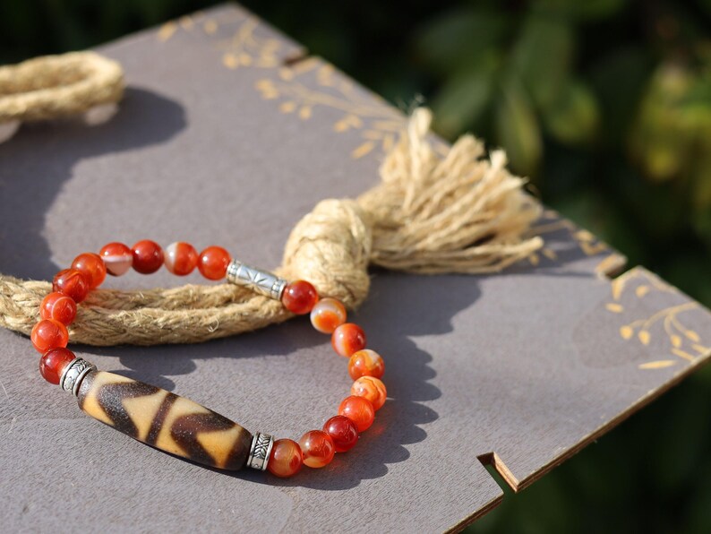 Old Double DZI Bracelet with Red Agate was known as the Warriors Stone. face challenges and adversities, protective amulets