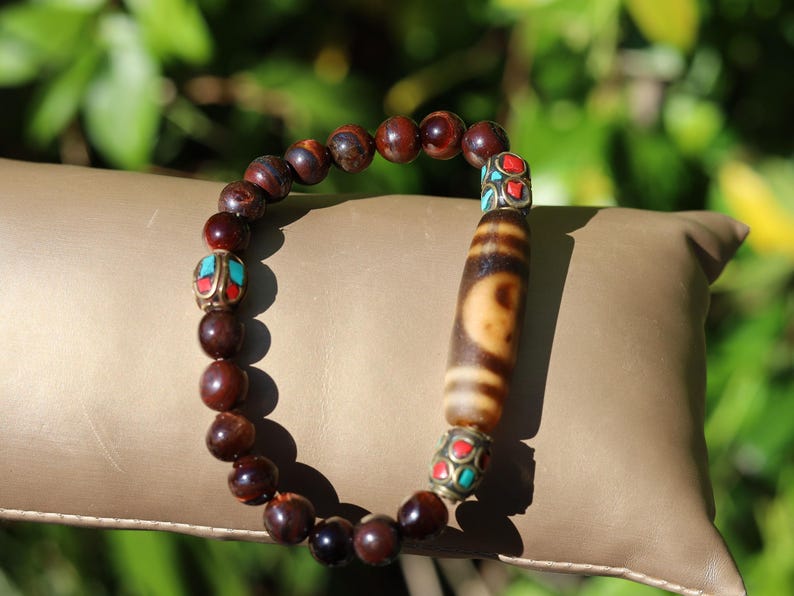 Wajakaa Design | Yin Yang Dzi Bead Bracelet | Tiger Eye • Handmade Nepal Brass • Turquoise & Coral Inlay.