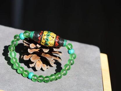 Andean Diamond Barrel Bead Bracelet | Moldavite • Tibetan Green Turquoise Prayer Beads.A sacred fusion. reflecting centuries of Quechua