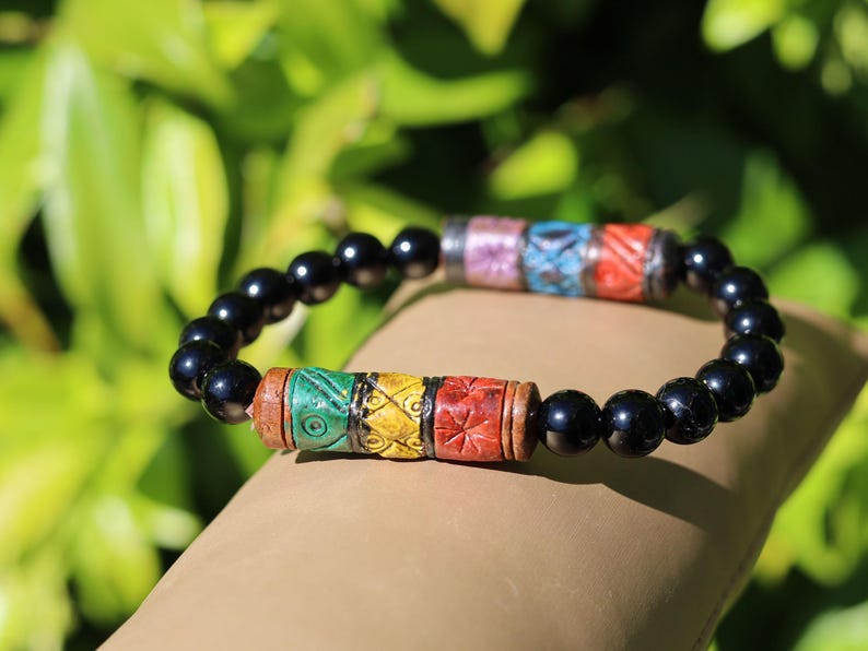 Onyx & Andean Barrel Bead Bracelet | Protection • Strength • Cultural Heritage. fusion of ancestral Peruvian symbolism