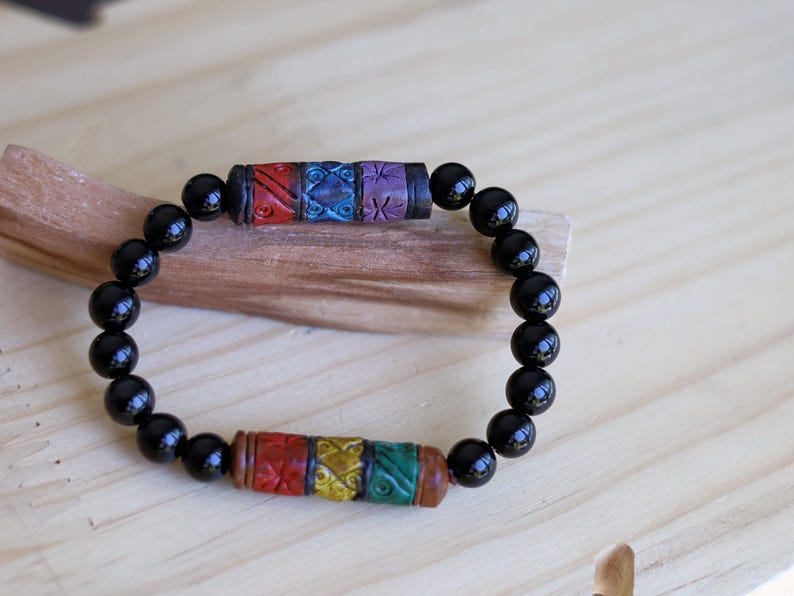 Onyx & Andean Barrel Bead Bracelet | Protection • Strength • Cultural Heritage. fusion of ancestral Peruvian symbolism