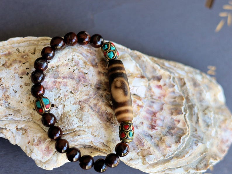 Wajakaa Design | Yin Yang Dzi Bead Bracelet | Tiger Eye • Handmade Nepal Brass • Turquoise & Coral Inlay.