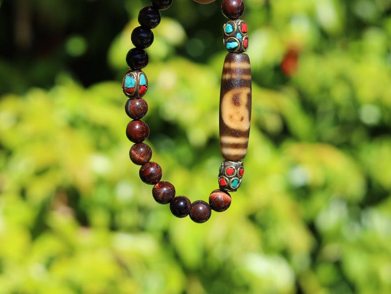 Wajakaa Design | Yin Yang Dzi Bead Bracelet | Tiger Eye • Handmade Nepal Brass • Turquoise & Coral Inlay.