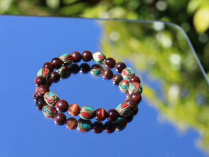 Wajakaa Design | Tiger Eye Bracelet with Handmade Nepalese Brass Beads | Turquoise & Coral Inlay.
