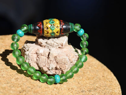 Andean Diamond Barrel Bead Bracelet | Moldavite • Tibetan Green Turquoise Prayer Beads.A sacred fusion. reflecting centuries of Quechua