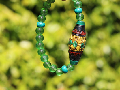 Andean Diamond Barrel Bead Bracelet | Moldavite • Tibetan Green Turquoise Prayer Beads.A sacred fusion. reflecting centuries of Quechua