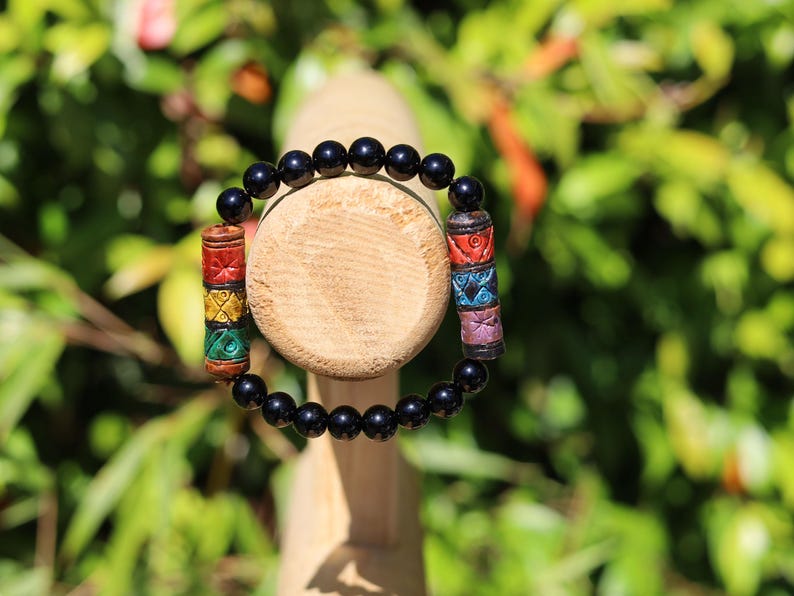 Onyx & Andean Barrel Bead Bracelet | Protection • Strength • Cultural Heritage. fusion of ancestral Peruvian symbolism
