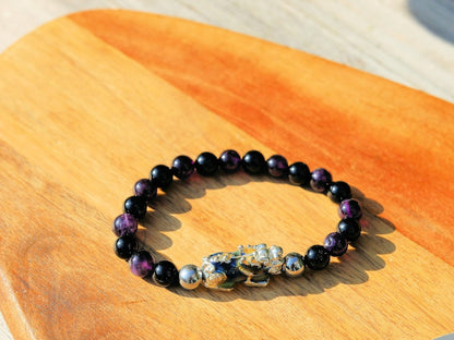 This Pixiu Amulet Bracelet features Jade | Amethyst | Black Onyx. believed to bring wealth,good fortune, and protection from negative energy