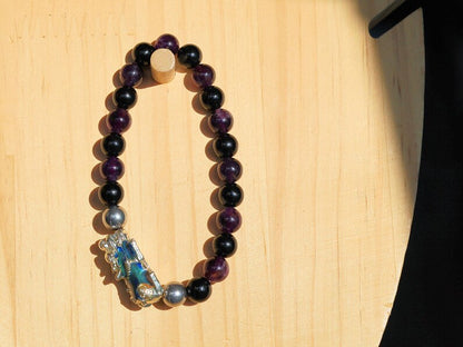 This Pixiu Amulet Bracelet features Jade | Amethyst | Black Onyx. believed to bring wealth,good fortune, and protection from negative energy