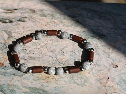 Frosted Picasso Stone & Rosewood Bracelet –Natural Balance and Style. Embrace the beauty of natural textures with this Frosted Picasso Stone