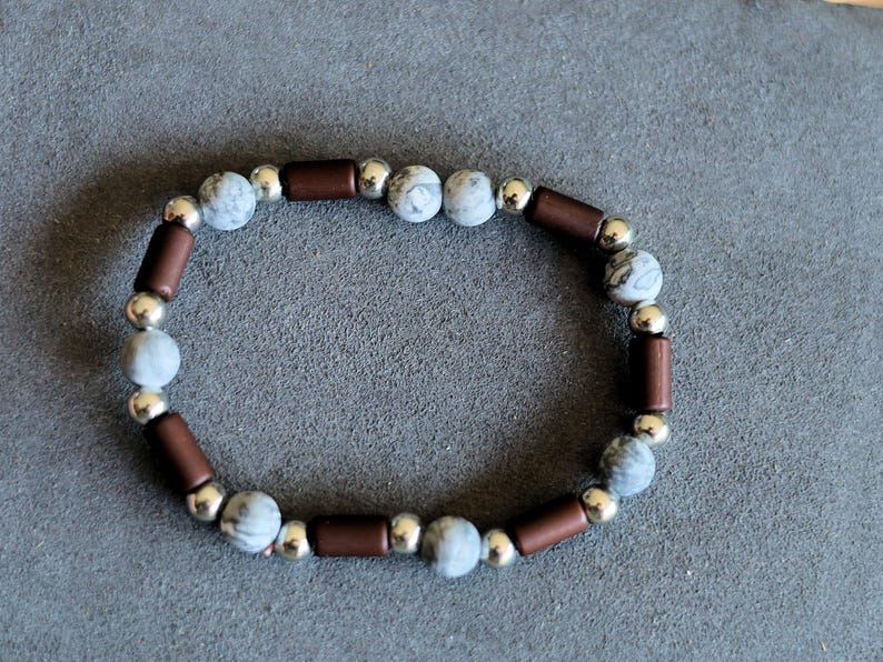 Frosted Picasso Stone & Rosewood Bracelet –Natural Balance and Style. Embrace the beauty of natural textures with this Frosted Picasso Stone