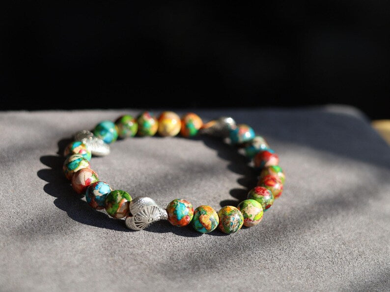Colorful Sea Sediment Turquoise Bracelet – Tibetan Heart Design. Infuse your style with color, culture, and calm energy