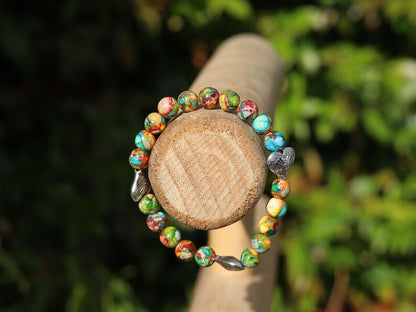 Colorful Sea Sediment Turquoise Bracelet – Tibetan Heart Design. Infuse your style with color, culture, and calm energy