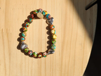 Colorful Sea Sediment Turquoise Bracelet – Tibetan Heart Design. Infuse your style with color, culture, and calm energy