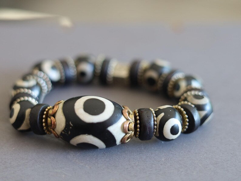 Collector Grade Tibetan 3-Eyed Dzi Bead Bracelet – Antique Old Agate Amulet. Own a piece of ancient spiritual heritage