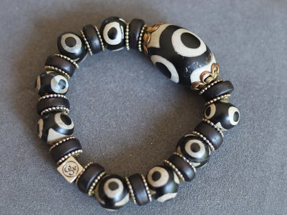 Collector Grade Tibetan 3-Eyed Dzi Bead Bracelet – Antique Old Agate Amulet. Own a piece of ancient spiritual heritage