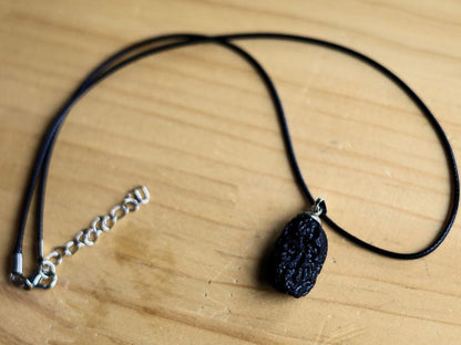 Ancient Cosmic Energy—Tektite Necklace from Laos (800,000 Years Old). Extraterrestrial Connection. Limited availability.Cosmic Connection