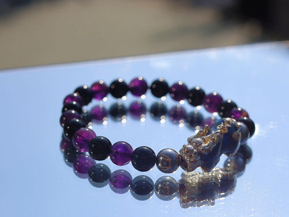 This Pixiu Amulet Bracelet features Jade | Amethyst | Black Onyx. believed to bring wealth,good fortune, and protection from negative energy