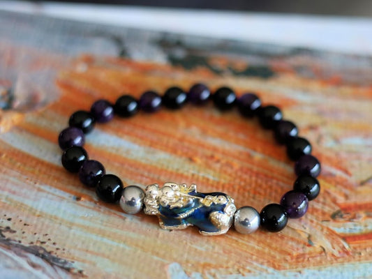 This Pixiu Amulet Bracelet features Jade | Amethyst | Black Onyx. believed to bring wealth,good fortune, and protection from negative energy